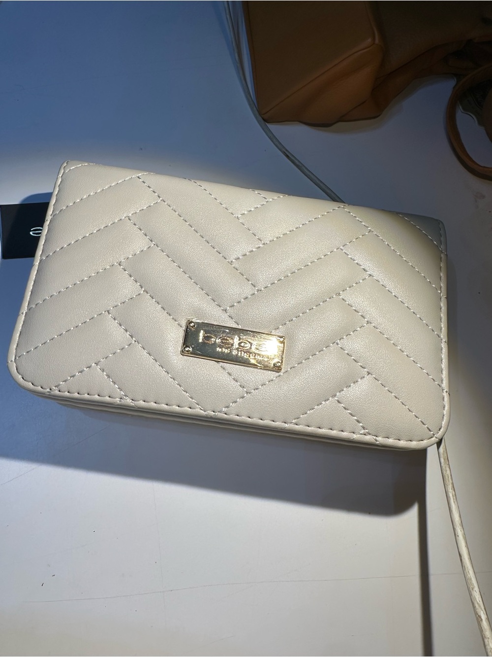 bebe Cream Quilted Crossbody with Gold Plaque